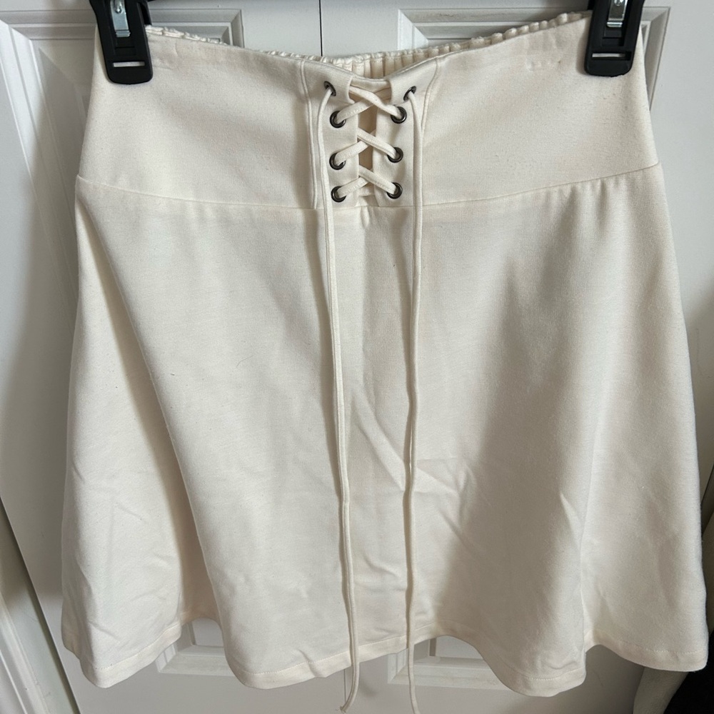 Elegant Cream Skater Skirt with Lace-Up Detail